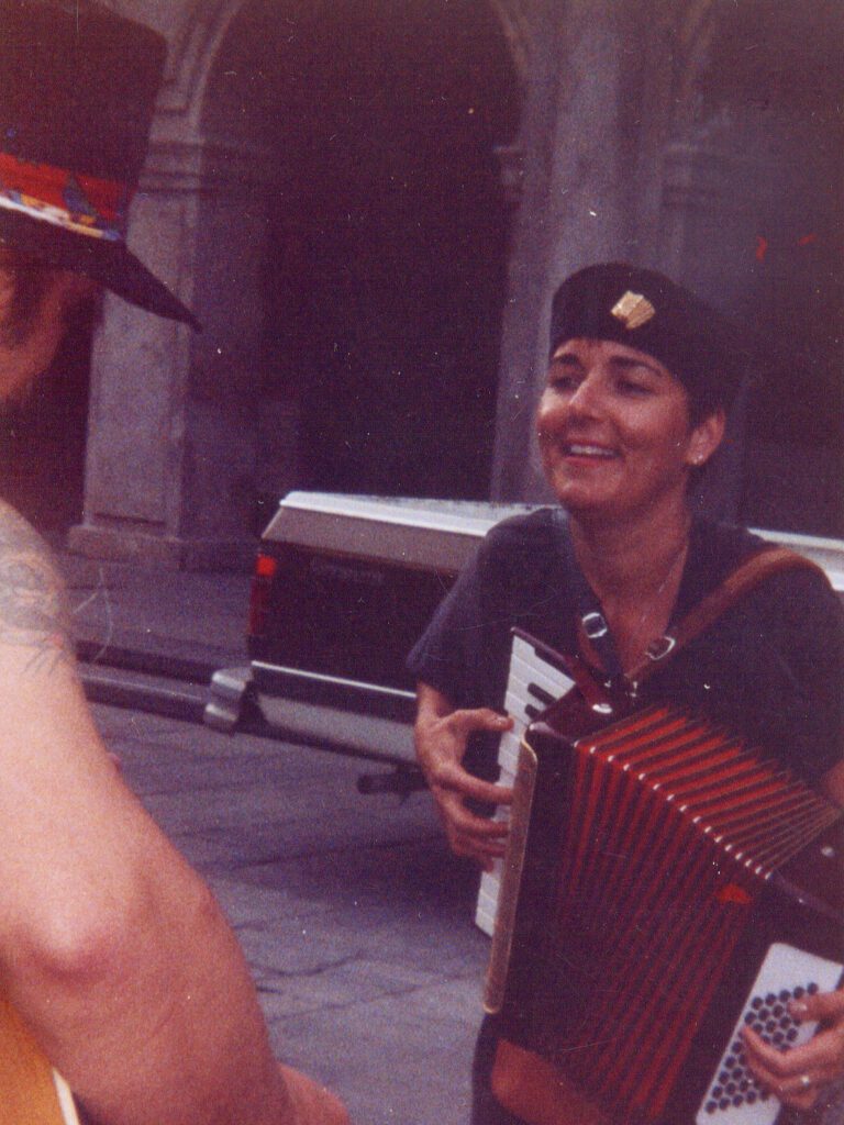 Debra Peters playing accordion with Butch Trivette on guitar. Street musicians in New Orleans