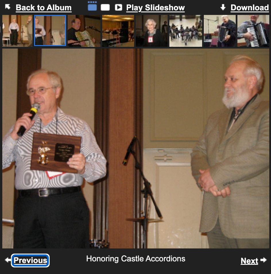 Norman Seaton and Randy McPeck honoring Castle Accordions at an NAA event
