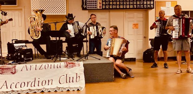 Debra Peters leading an accordion jam session with the Arizona Accordion Club in 2023