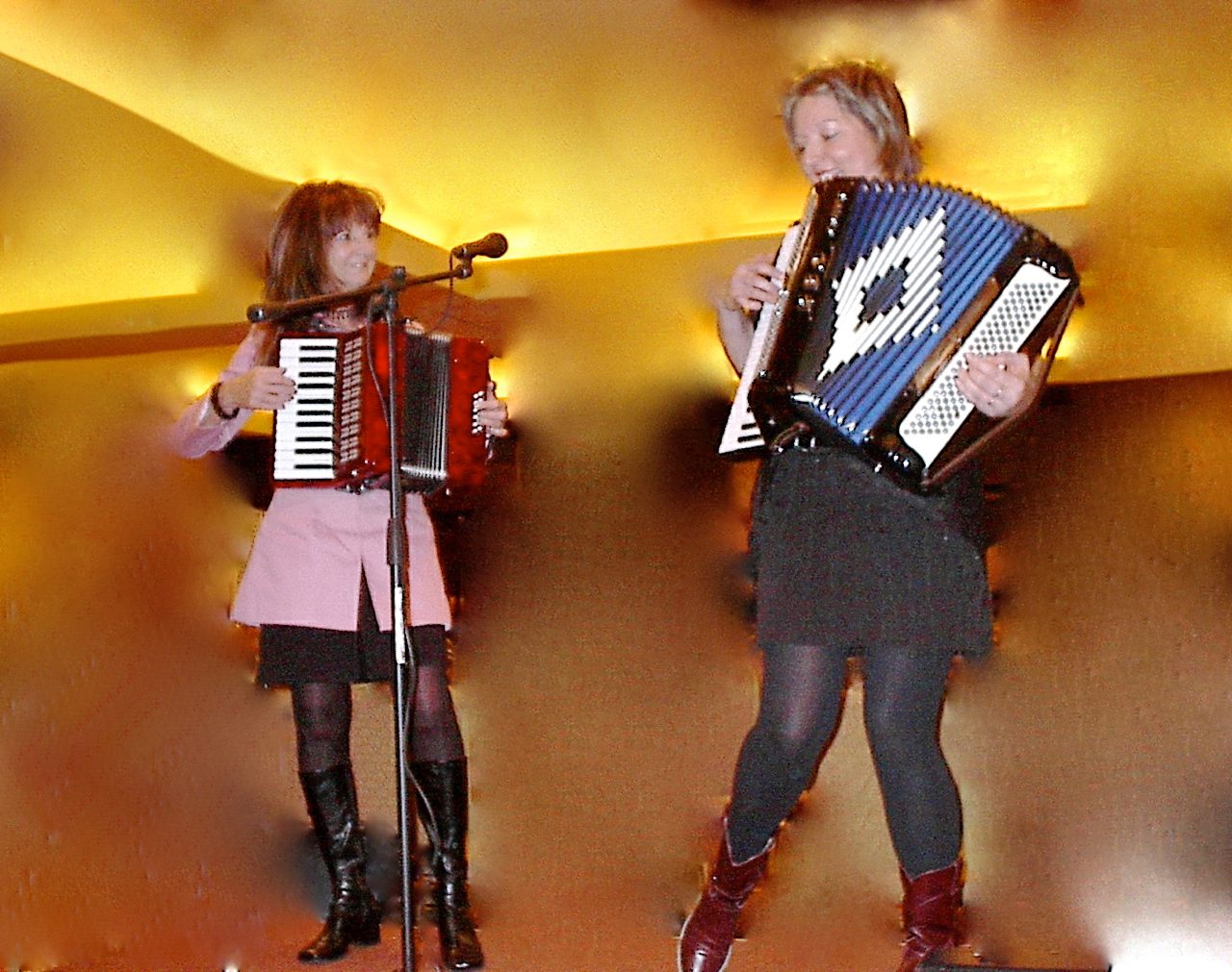 Debra Peters and Carol Garrison performing accordion duet at National Accordion Association event