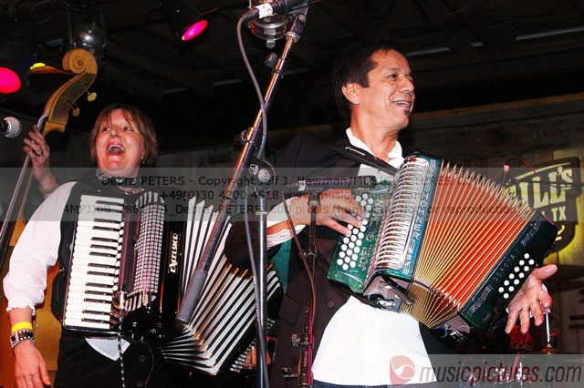 Debra Peters singing and playing accordion with Joel Guzman at Squeezbox Mania at Threadgill’s in Austin, Texas