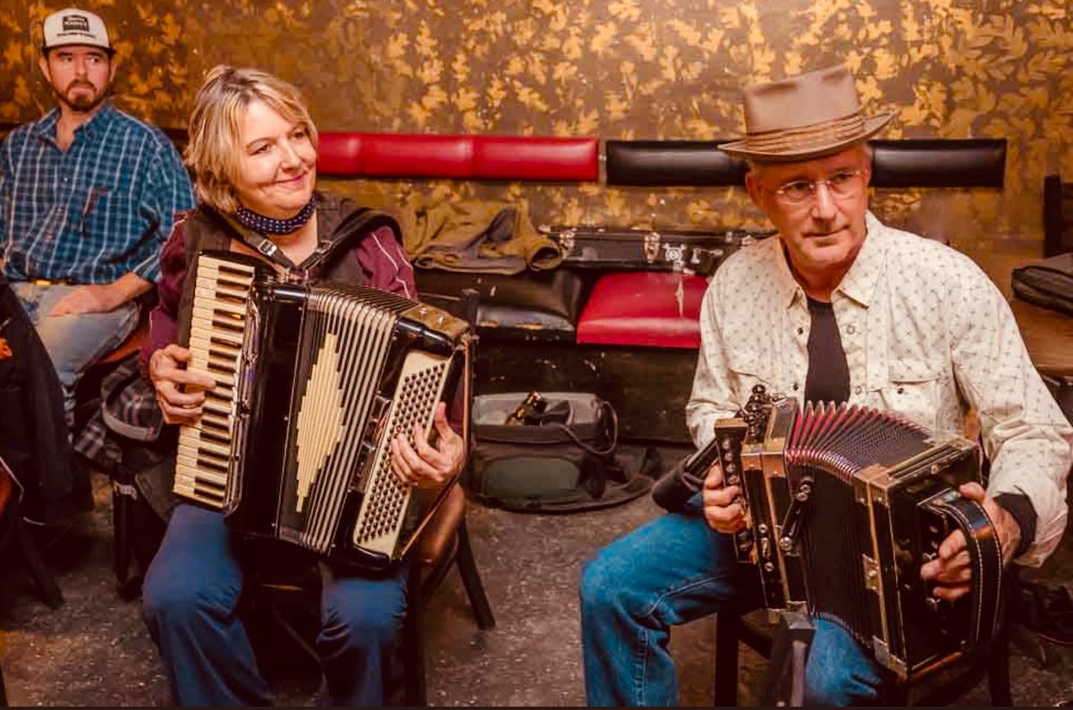 Debra Peters playing accordion with Kirk Walker at Austin Cajuns Jam Session