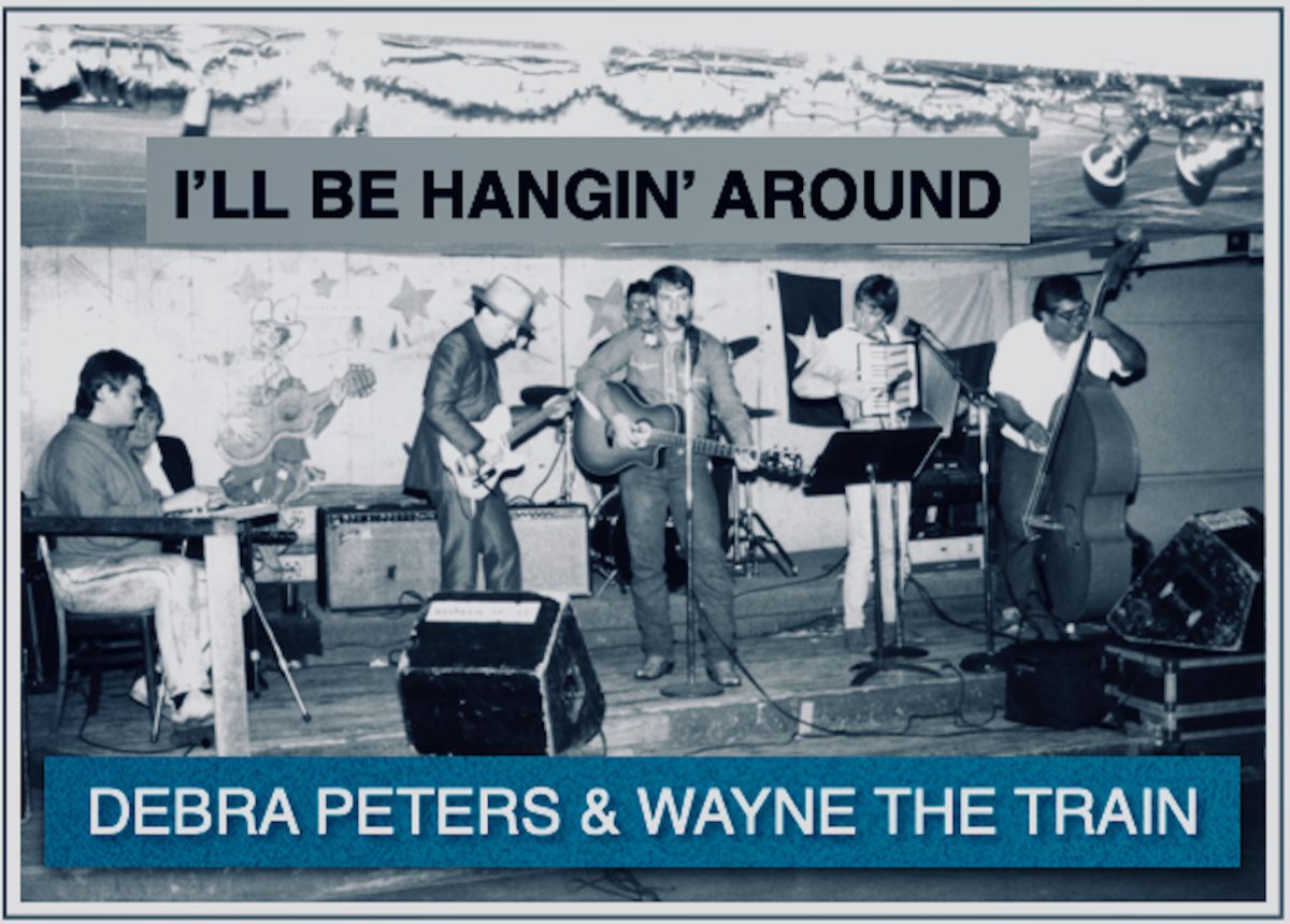 Debra Peters performing with Wayne the Train Hancock and band playing “I’ll Be Hangin’ Around” in the Broken Spoke Dancehall 1991