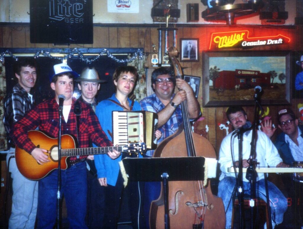 Debra Peters with The Love Saints band performing at the Broken Spoke in 1991