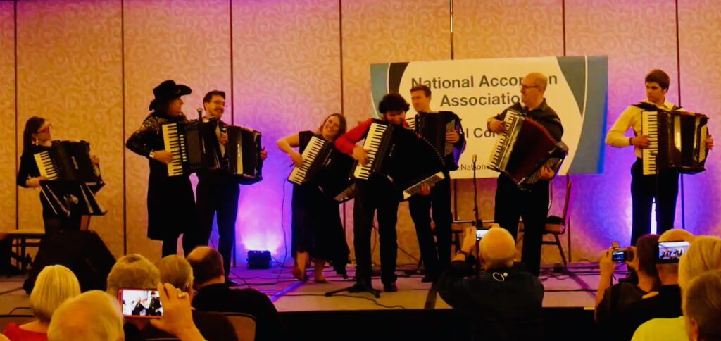 National Accordion Association (NAA) group performance on stage at Saturday concert