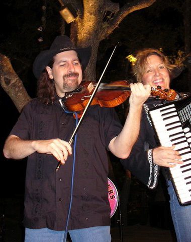 Debra Peters playing accordion with violinist Sean Orr at Nutty Brown Cafe