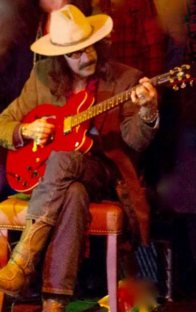 Spencer Jarmon playing red guitar